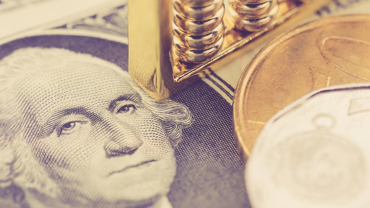 Close-up image of a U.S. dollar bill, Euro coin, and stack of gold coins representing currency exchange and supply-demand dynamics in forex trading.