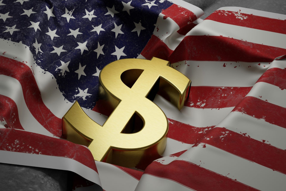 a golden dollar sign on a distressed American flag, symbolizing economic uncertainty.