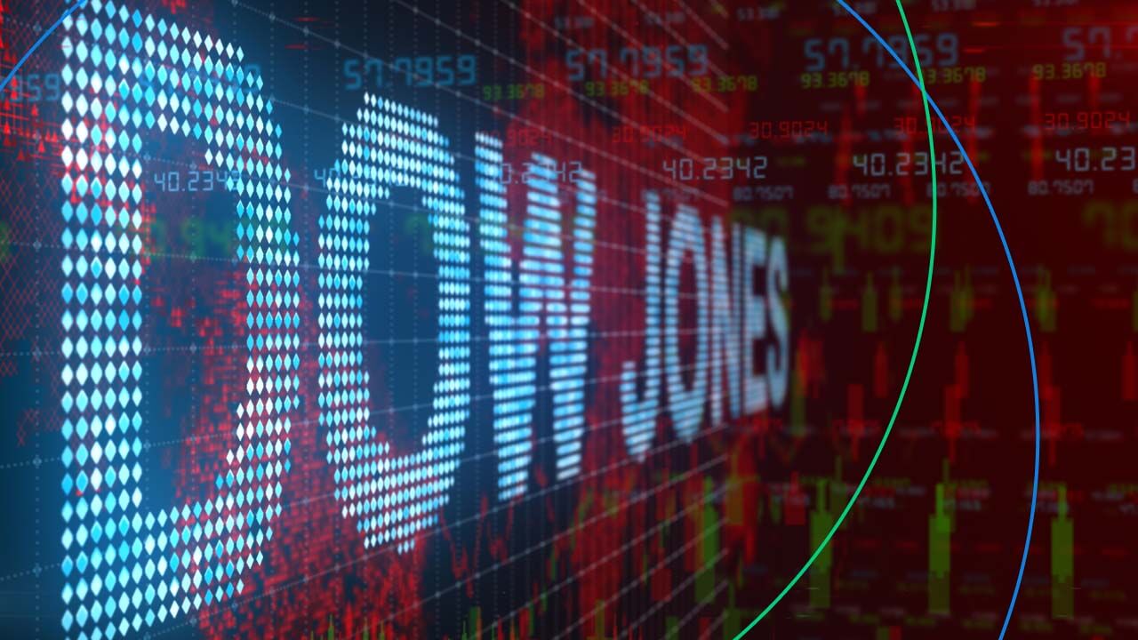 Digital display showing the words 'DOW JONES' with stock market tickers and red/green candlestick patterns in the background, illustrating the concept of Dow Jones.