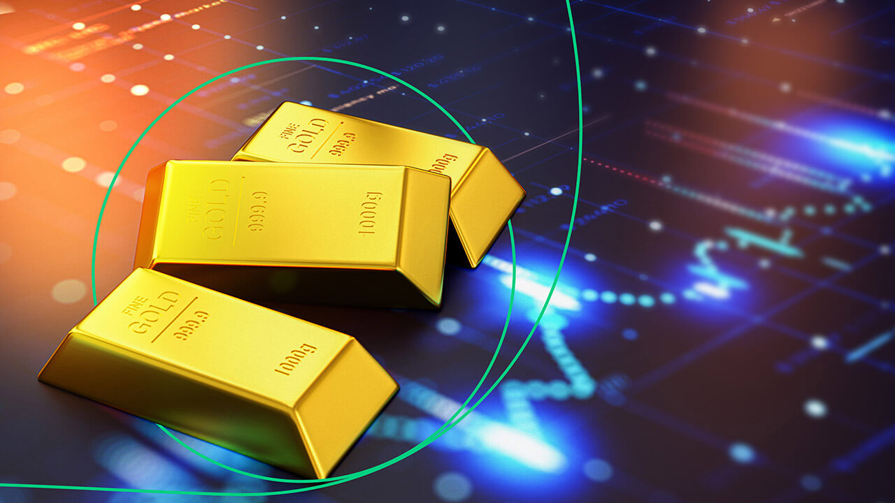 gold bars stacked on a glowing digital chart background