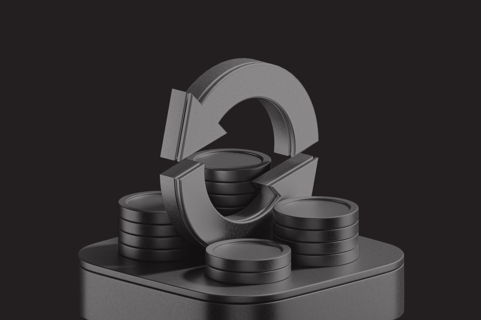 a 3D image of grey stacked coins with a large circular arrow