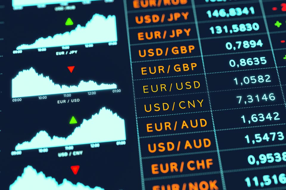 A forex trading screen displaying currency pairs and price charts, illustrating how to identify a trend in the forex market.