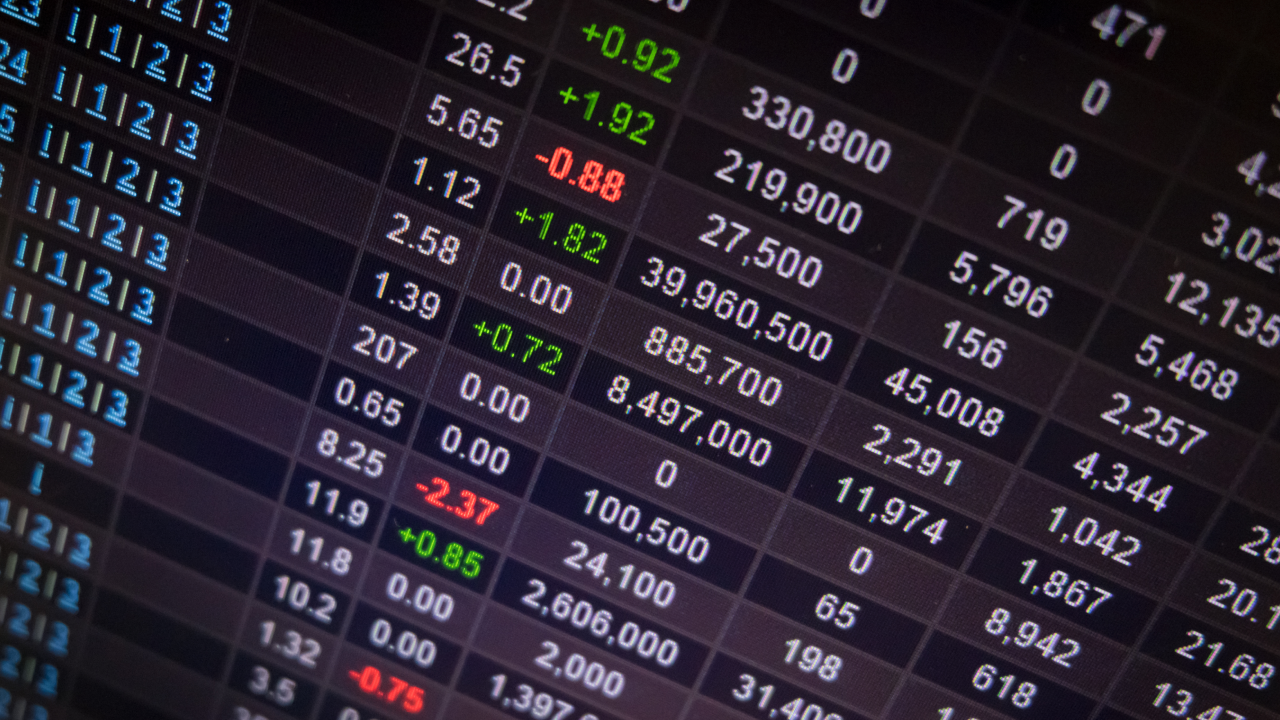 Top Industries in FRA40 Index, illustrated by the stock market on an LED display screen.