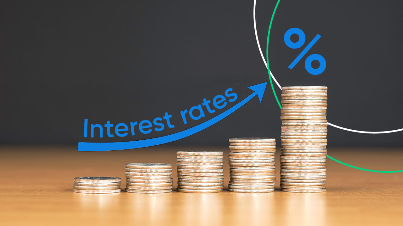 A visual representation of rising interest rates, showing stacks of coins increasing in height from left to right. 
