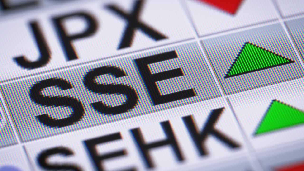 Image of a stock market display with ticker symbols, including SSE, representing the Shanghai Index and its performance.