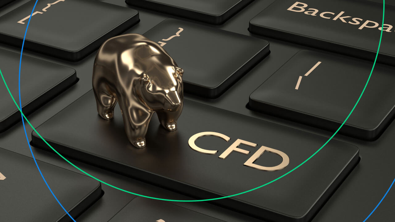 A metallic bear figurine placed on a black keyboard with a key labeled 'CFD,' symbolizing contract for difference (CFD) trading and market trends.