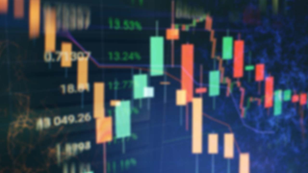 Understanding the Fear and Greed Index: A Comprehensive Guide for Forex Traders, illustrated by an abstract financial chart with candlestick patterns and price data, representing market sentiment analysis for forex trading.