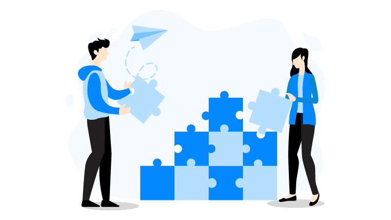 two people trying to complete a puzzle