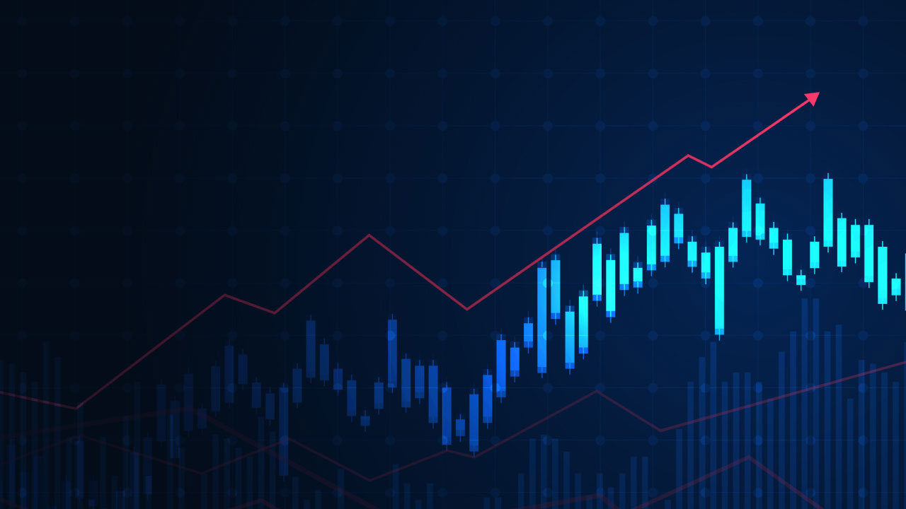 a financial chart showing a bullish market trend which features blue candlesticks indicating price movement