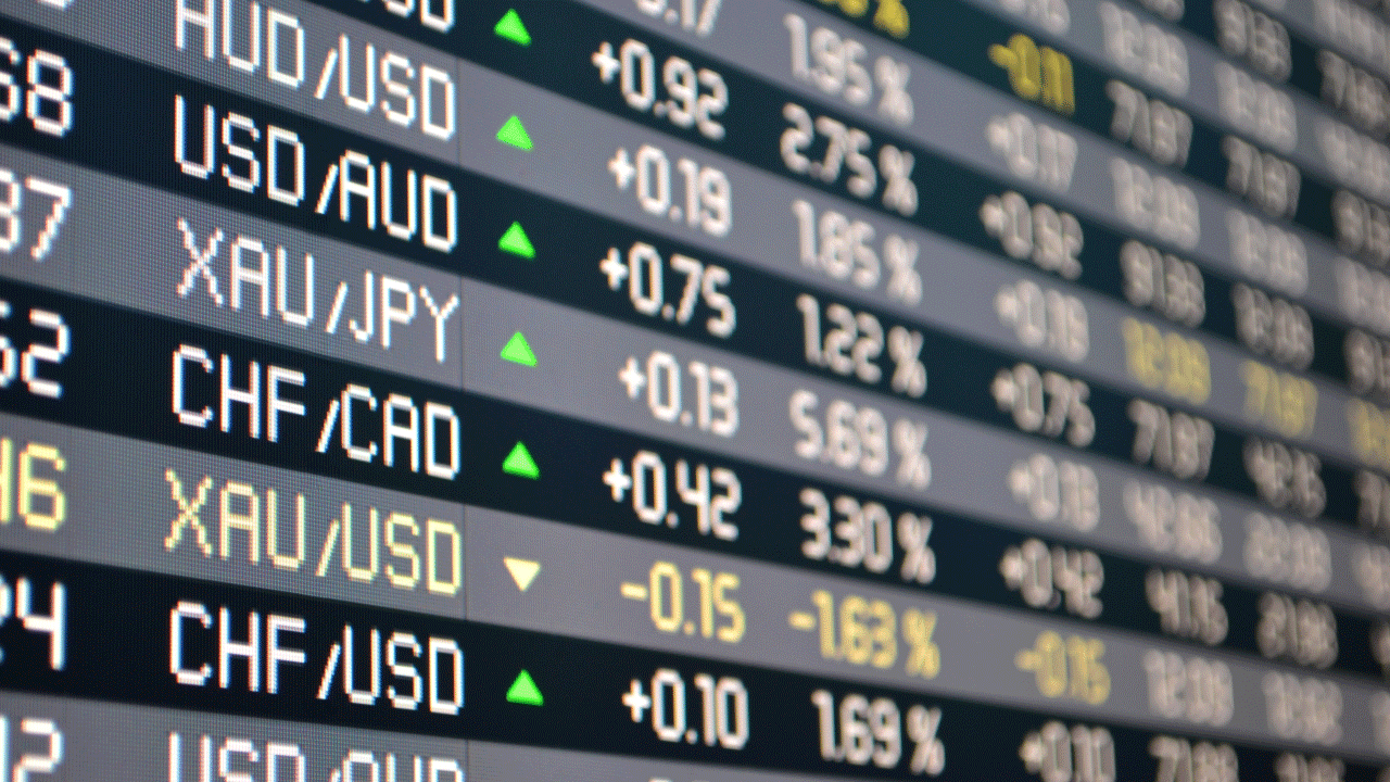 digital display showing live forex exchange rates for currency pairs