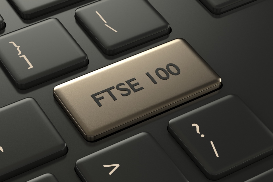 A metallic keyboard key labeled "FTSE 100," symbolizing market trends and the future outlook of the UK stock index.