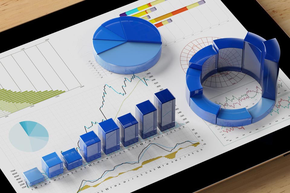 Digital tablet displaying 3D blue graphs and pie charts, illustrating an introduction to technical analysis in forex trading.