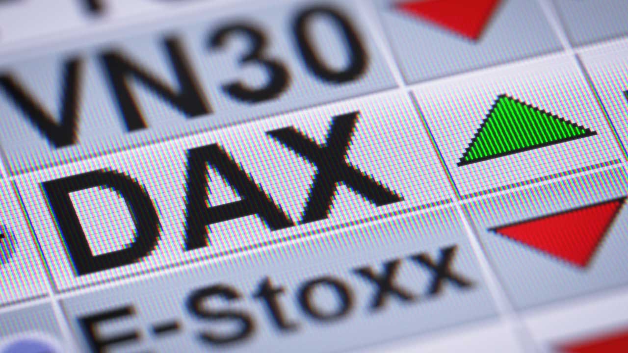 DAX 30 Index displayed on a digital trading screen with a green upward triangle indicating a rise in value.
